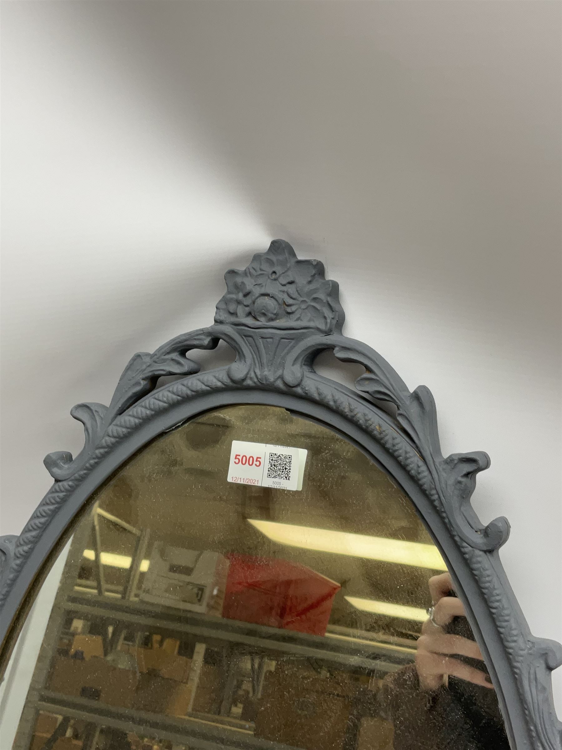 Oval ornate grey mirror, H68cm