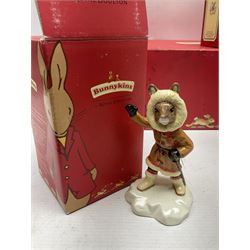 Royal Doulton The Mickey Mouse Collection Pluto figure, Coalport Characters The Snowman Dressing Up figure, three Royal Doulton Bunnykins figures comprising Policeman, Morris Danger and Eskimo, and display stand, Royal Doulton John Beswick Tiggy Winkle, Royal Albert Beatrix Potter Peter Postbag and three Goebel Hummel figures, all boxed