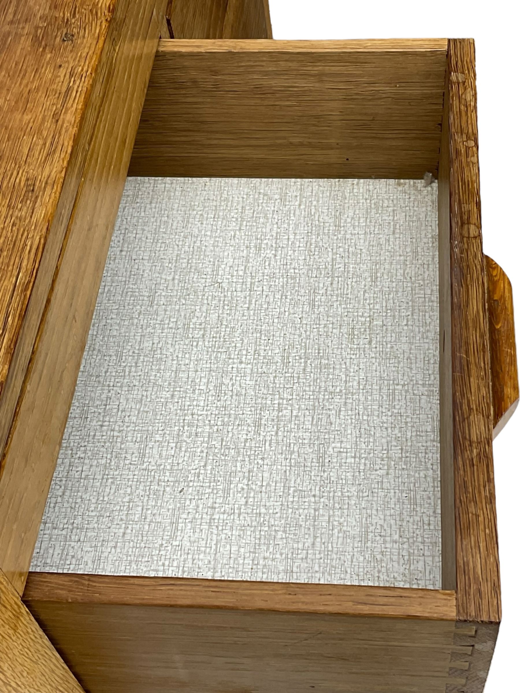 Yorkshire Oak - oak chest, fitted with two short over three long drawers, on octagonal feet with castors 