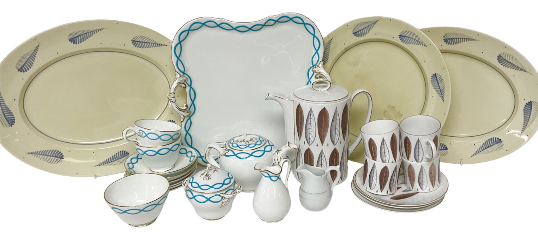 Victorian cabaret set,  comprising teapot, milk jug, covered sucrier, open sucrier, two cups and saucers upon a tray, together with Susie Cooper Hyde Park pattern coffee set, comprising coffee pot, four coffee cans and saucers, dessert plates and three plates in a similar design 