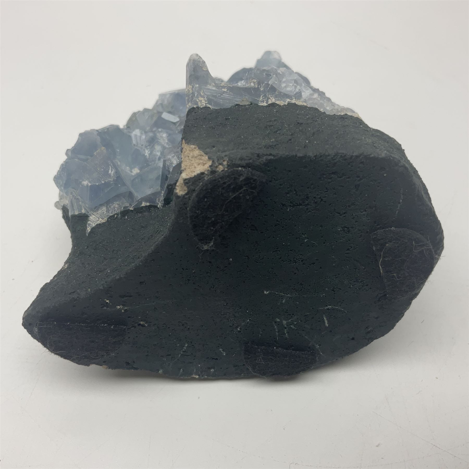 Celestine crystal geode cluster, with well-defined crystals of various sizes, H13cm 