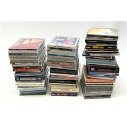 A collection of approximately seventy five CD's, to include a examples by Queen, The Jam, Ramones, U2, The Doors, Fleetwood Mac, Aretha Franklin, Donna Summer, Freddie Mercury, The Clash, Johnny Cash, The Beach Boys, Nick Cake & The Bad Seeds, Elvis, Chris Rea, etc. 