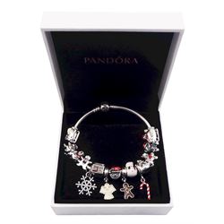 Silver Pandora bracelet with fifteen silver Pandora charms including two Disney 'Winnie the Pooh' Christmas charms, gingerbread man, candy cane, snowflake and Santa, with Pandora box