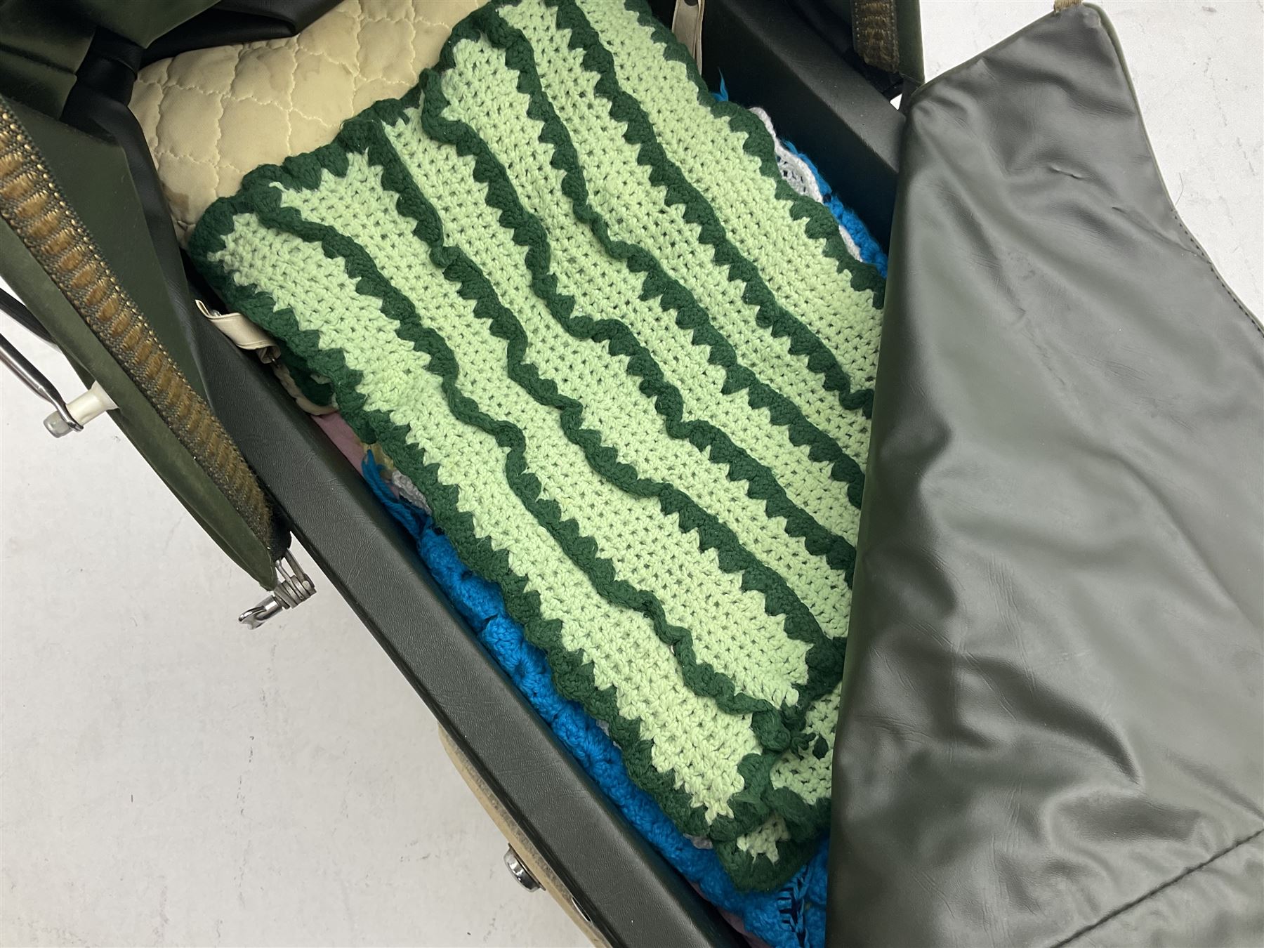 Silver Cross coach-built doll's pram with green fold-down hood and cover, sprung tubular frame, chrome and white handle, four spoked wheels with brake, mattress, pillow and bedding L97cm