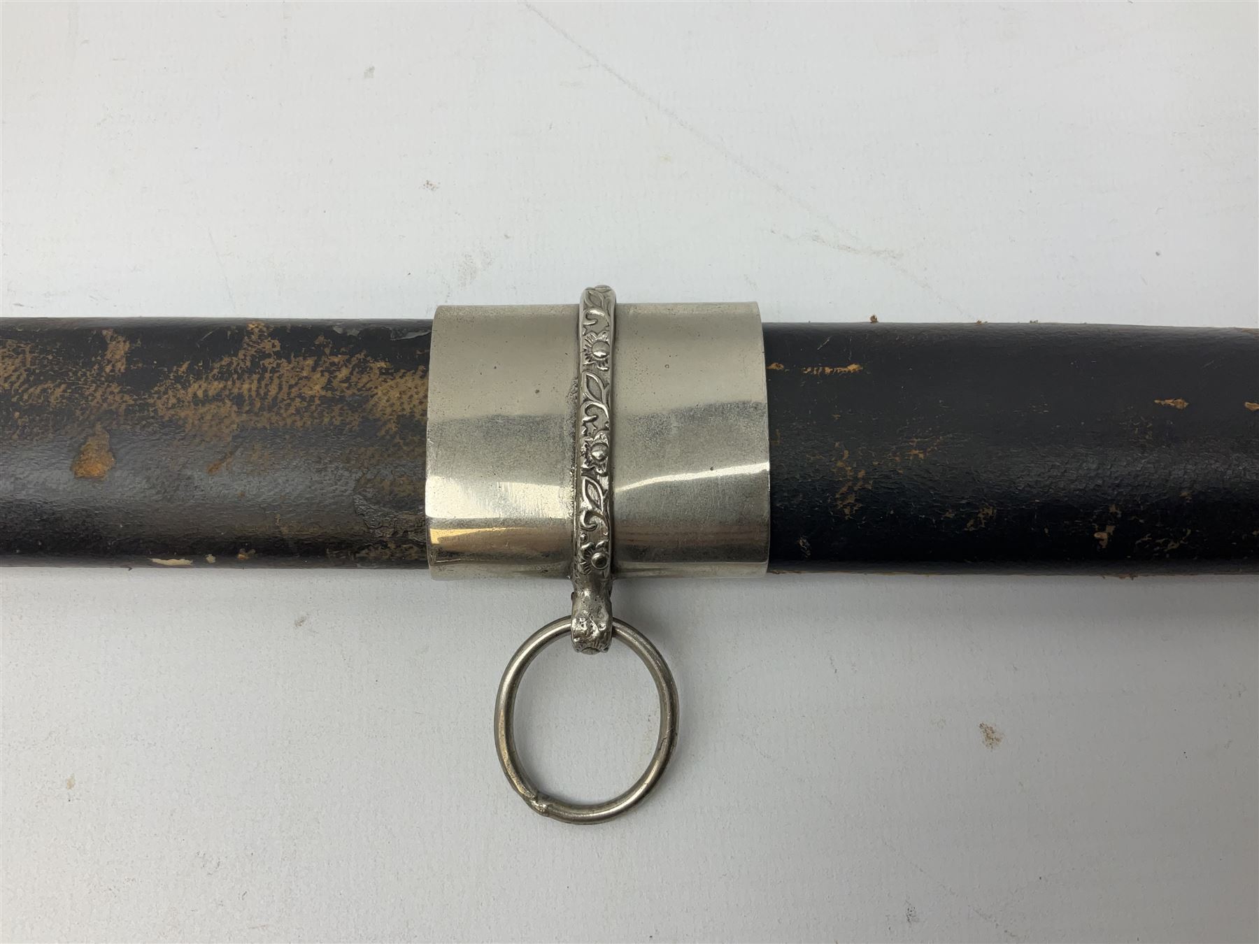 Reproduction Scottish basket hilted broadsword with 85cm double edged steel blade and red lined basket hilt with wire bound grip, in white metal mounted leather scabbard 107cm overall