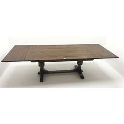  Old Charm oak drawer leaf dining table, carved cup and cover supports on shaped sledge feet joined by single stretcher (W275cm extended, 183cm closed, H76cm, D108cm) and set eight (6+2)  chairs, arched cresting rail with finials, studded leather back and seat, cup and cover supports joined by stretchers (W  