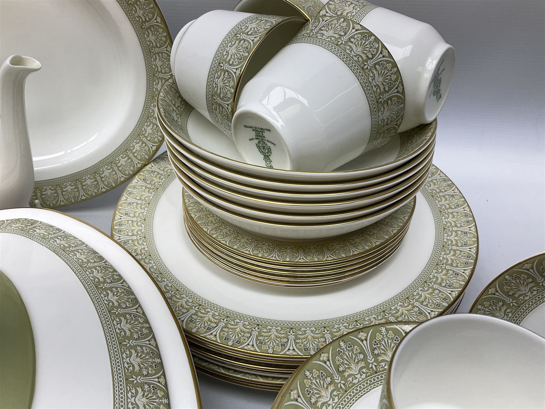 Royal Doulton Sonnet pattern part tea and dinner service, including  twelve dinner plates, twelve bowls, twelve side dishes, two covered tureens, one meat platter, coffee pot, twelve coffee cans and saucers etc (approx 90)