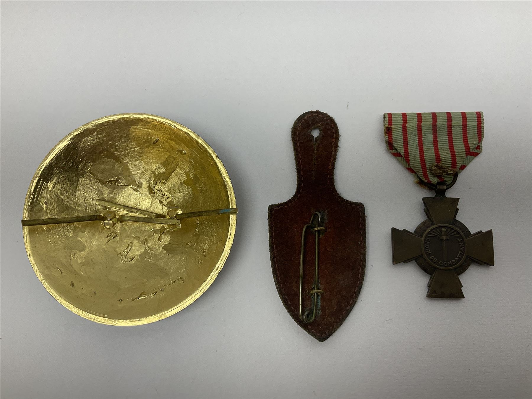 Five WW1 French medals comprising Medaille Militaire Gallantry Award, two Croix de Combattant, Medaille Commemorative Francais 1914-18 and a Patriotic Medal; together with small quantity of Russian badges etc
