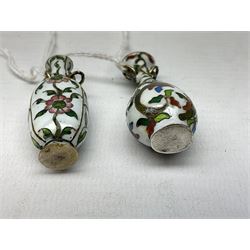 Two miniature Chinese cloisonné vases, each decorated with foliate design upon a white ground, each approximately H5cm