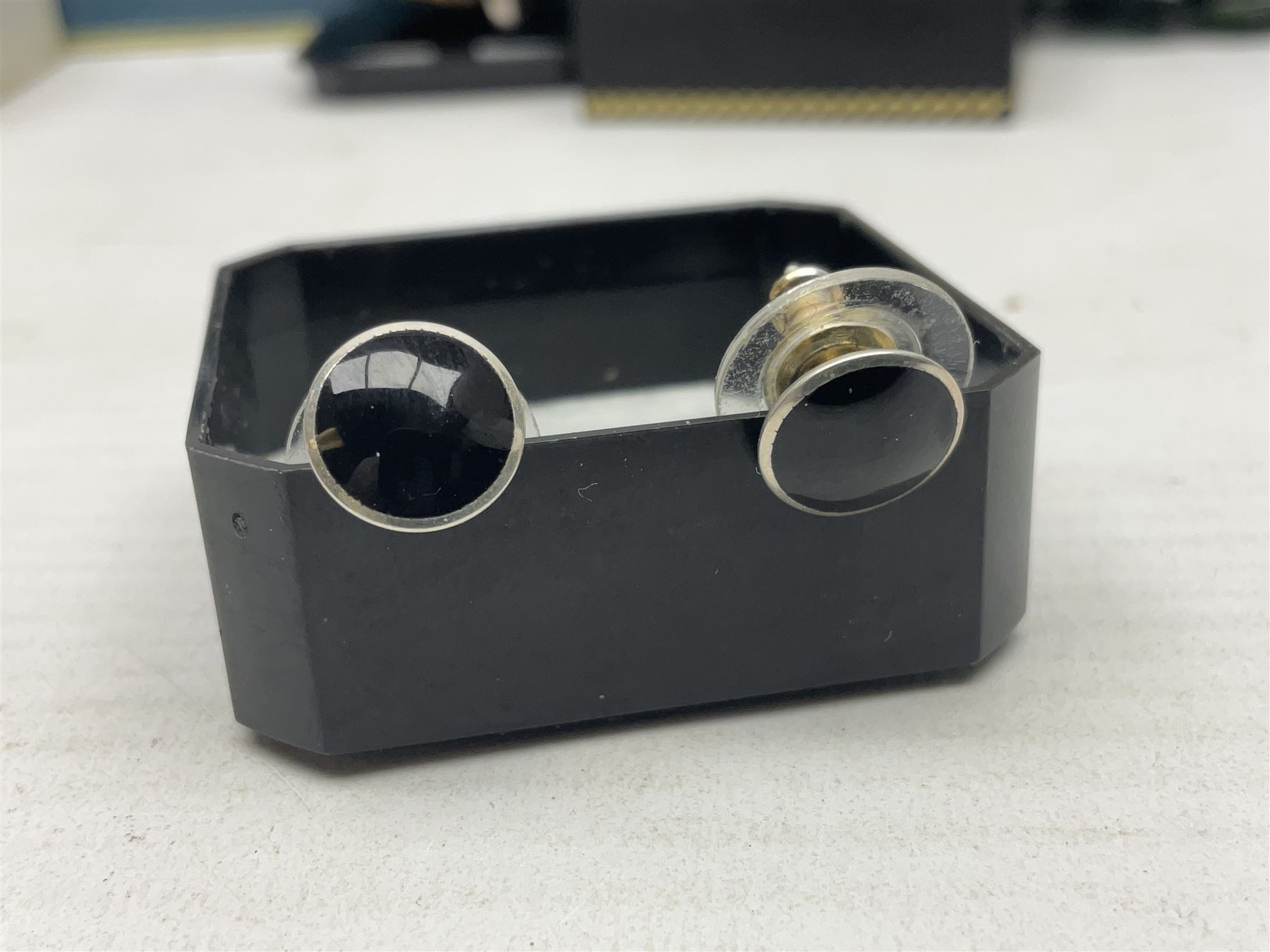 Silver ammonite pendant, silver earrings and a collection of beaded and other costume jewellery