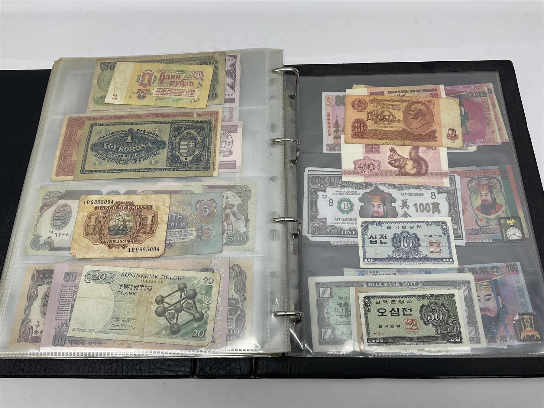 World and Great British banknotes to include Brazil, Canada, France, Germany, Ghana, Indonesia, Iraq, Hong Kong, Hungary, Japan, Vietnam, Zimbabwe, a collection of Chinese ‘Hell Money’, and quantity of ‘De La Rue Systems’ test notes, housed in ring binder and loose