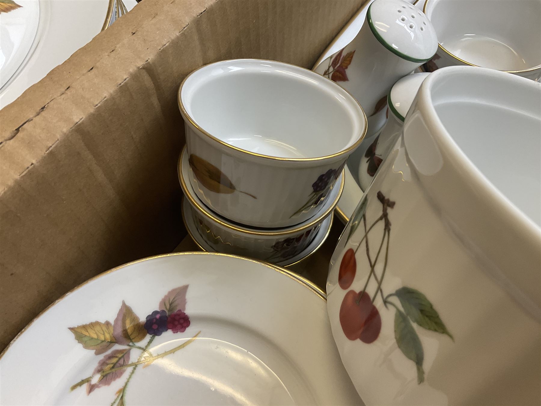 Royal Worcester Evesham and Evesham Vale tea and dinner wares, to include, three large covered tureens, coffee pot, eight tea cups and saucers, milk jug, two covered sucriers, boxed serving spoons etc, approx .130