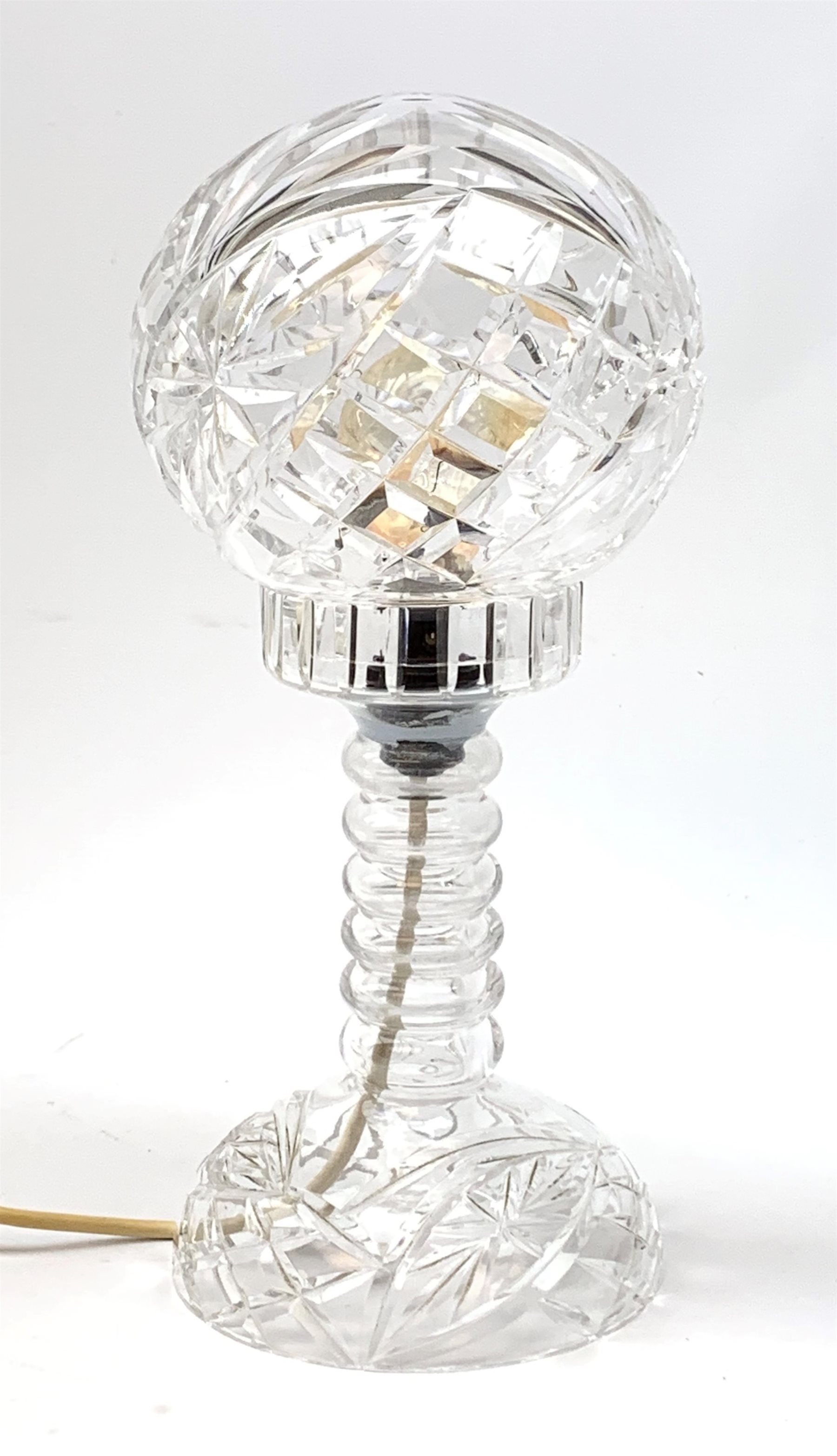 A clear cut glass table lamp, with domed glass shade, H35cm