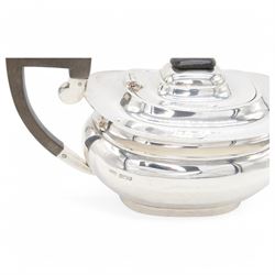 1920s silver tea pot, of oval bellied form, with Bakelite type handle and finial, hallmarked C W Fletcher & Son Ltd, Sheffield 1923, H15cm