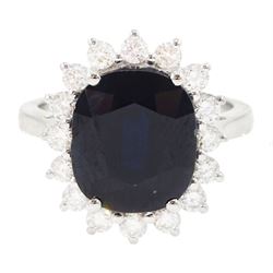18ct white gold sapphire and round brilliant cut diamond cluster ring, stamped 750, sapphire 5.05 carat, total diamond weight 0.64 carat