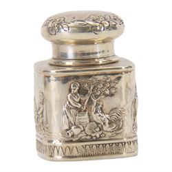 Late 19th century German Hanau silver miniature novelty scuttle, of cylindrical form with side handle and swing handle, the body impressed with figural genre scene, with Hanau marks for Karl Kurz, and hallmarked Samuel Boyce, Chester 1902, with 'F' foreign import mark, not including handle H3.5cm, together with a late 19th century German Hanau silver miniature novelty tea caddy, of rounded cube form, the body impressed with figures at work in a countryside setting, with Hanau marks for Neresheimer & Sohne, and hallmarked B Muller & Son, Chester import 1907, and marked 925, H5cm