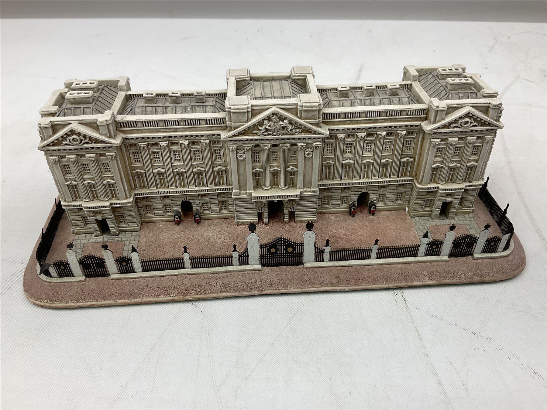 Three Lilliput Lane models from the 'Britain's Heritage' collection, comprising The Royal Pavilion Brighton, St Paul's Cathedral and Buckingham palace, all boxed