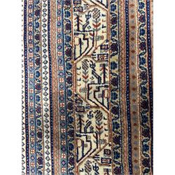 Large North-West Persian Arrak indigo ground carpet, the field decorated all-over with small Boteh motifs, multiple band border decorated with repeating geometric designs 