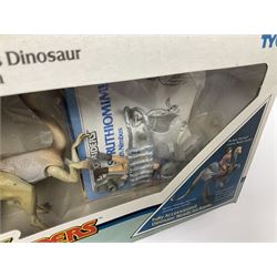 Dino-Riders 1980s by Tyco Action-GT, Stegosaurus with Tark and Vega Heroic Dino-Riders; Triceratops with Hammerhead and Sidewinder Evil Rulon Warriors; and Struthiomimus with Nimbus Heroic Dino-Rider; all boxed; two Action Figures, re-bagged on original card backing; and two VHS video tapes (6)