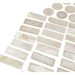 Chinese mother of pearl gaming tokens, of varying shape and design, including carved and engraved examples