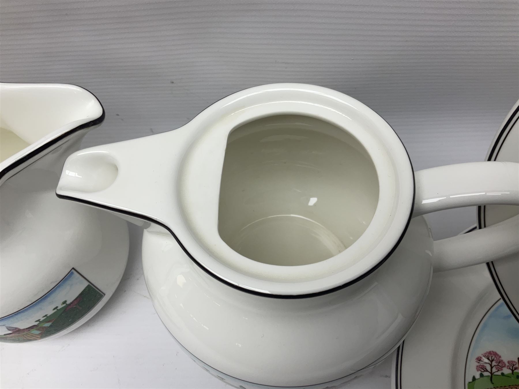 Villeroy and Boch Naif pattern tea service, comprising teapot, jug, covered sucrier, two mugs, two breakfast bowls and four side plates (11)