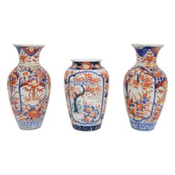 Japanese Imari dish, with scalloped edge, the internal decoration with panels of blossoming branches and a central bird, together with another imari bowl and three vases, scalloped dish H7cm