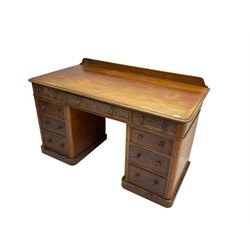 Late 19th century mahogany twin pedestal desk, raised back, fitted with nine graduating drawers