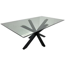 Contemporary glass and metal dining table, rectangular glass top on black finish steel X-framed base