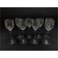  A set of eight English early 20th century Thomas Webb hock glasses, with engraved floral swag detail to the bowls, marked beneath Webb, H19.5cm.  