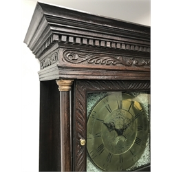 19th century heavily carved oak longcase clock, projecting dentil cornice over scrolled acanthus carved frieze, the trunk door carved with flower heads, brass dial with Roman and Arabic chapter ring, engraved with trailing leafage, subsidiary calendar aperture, the chapter ring signed 'Will, Snow', 30-hour movement striking the hours on bell, dial - 30.7cm x 30.7cm, H206cm (with weight and pendulum)