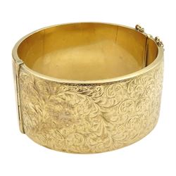 9ct gold wide hinged bangle, with bright cut foliate decoration, by Smith & Pepper Ltd, Birmingham 1963, boxed