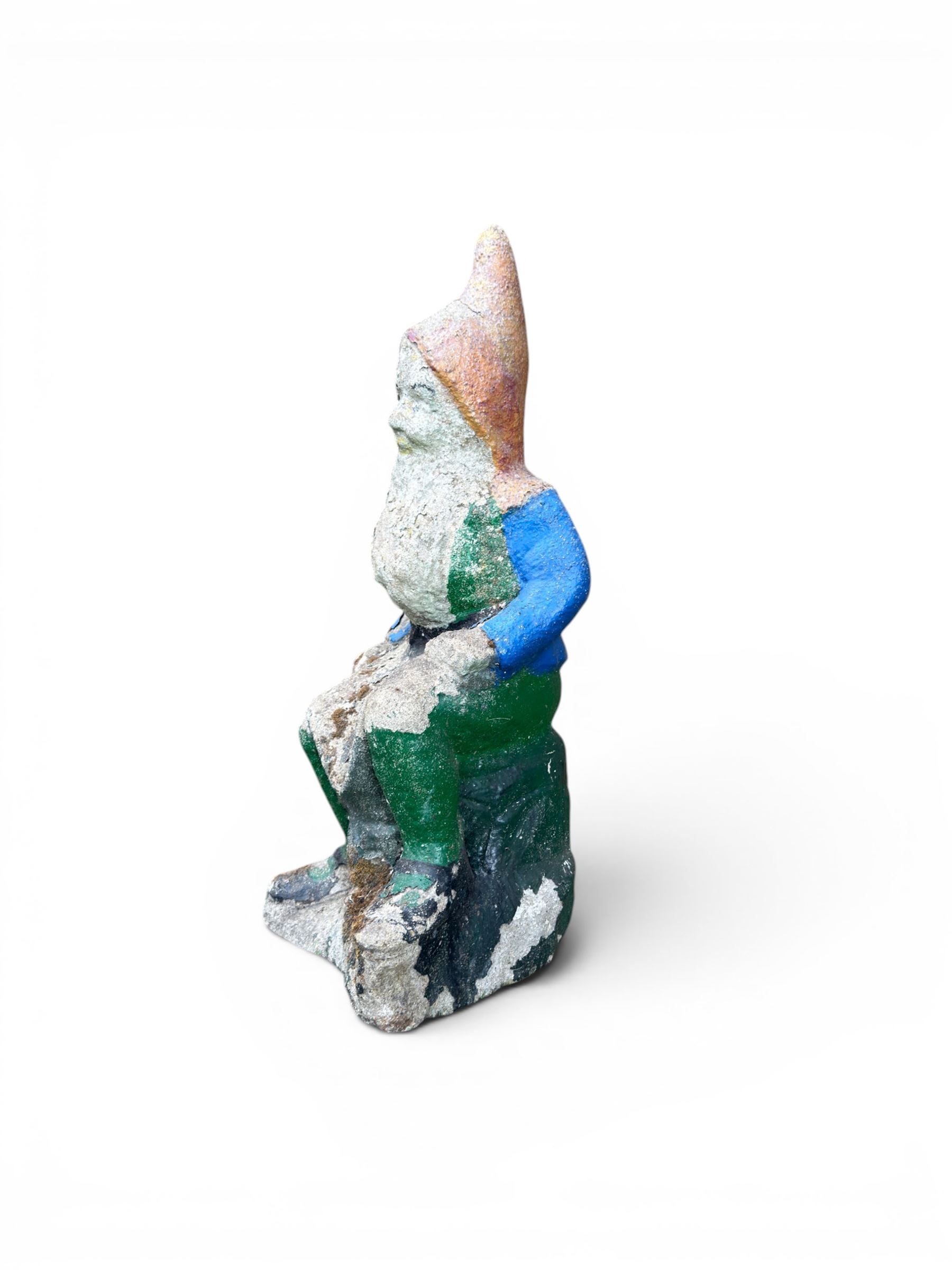 Early large scale composite stone garden gnome, original distressed paint