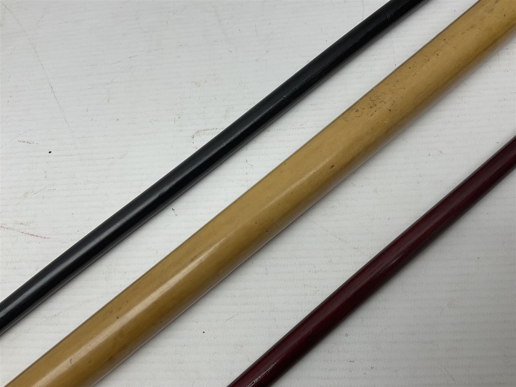 Three parade ground canes - malacca cane Coldstream Guards with plated mount engraved 'H.A. Myhan' L87cm; ebonised Church Lads Brigade 'Fight The Good Fight'; and mahogany stained Worcestershire Regiment (3)