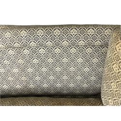 Howard & Sons - Edwardian mahogany framed two seat sofa, upholstered in original H&S foliate patterned fabric with sprung seat and overstuffed back and arms, raised on square tapering supports, the rear leg stamped '19600 1795 Howard & Sons Ltd Berners Street'