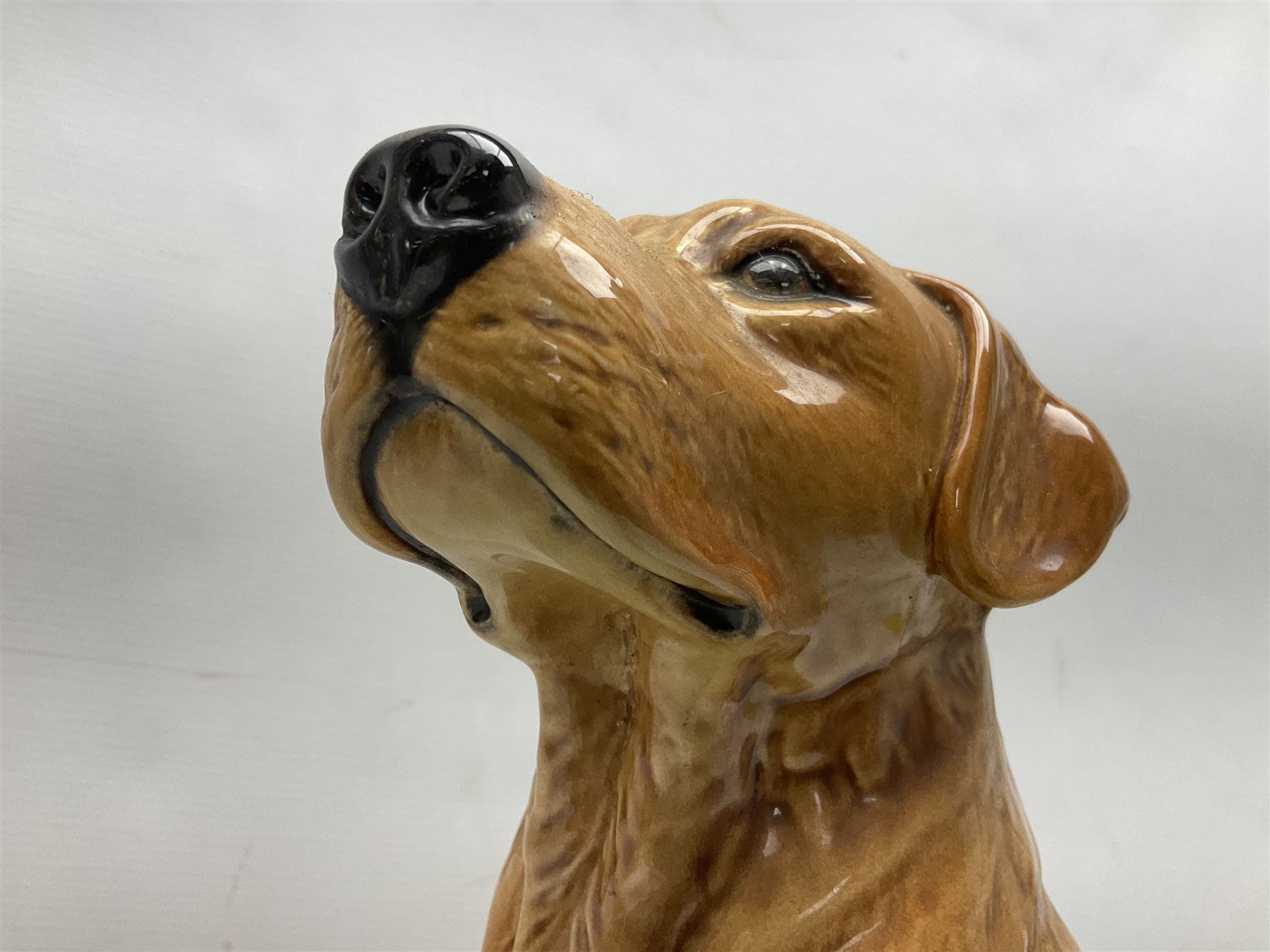 Large Beswick fire side figure of a yellow labrador, modelled seated, no. 2314, with impressed marks beneath, H34cm