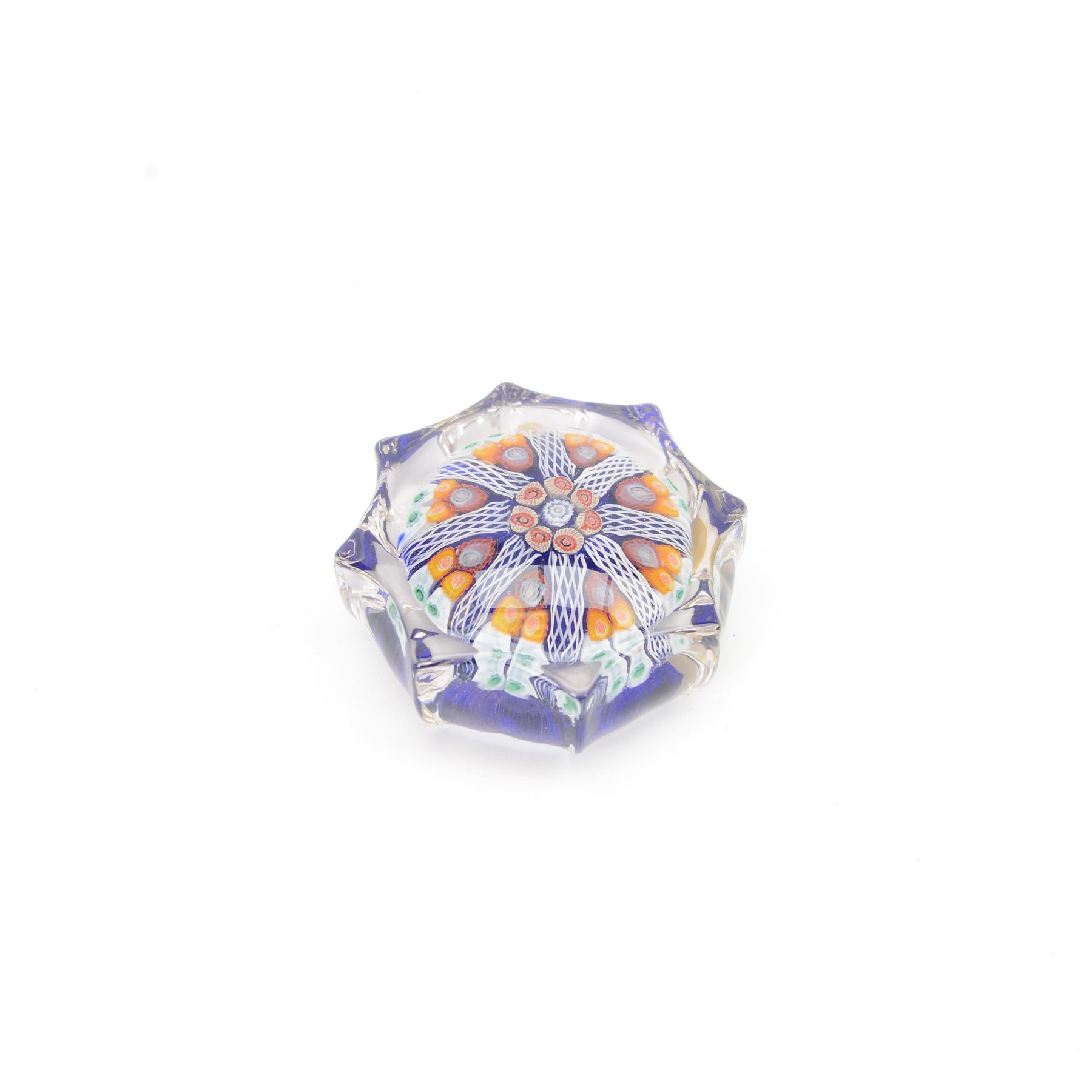 Six millefiori paperweights, two of eight pointed star form, four of domed form