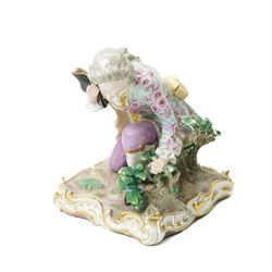 19th century Meissen figure of a gallant kneeling on gilded square base H16cm