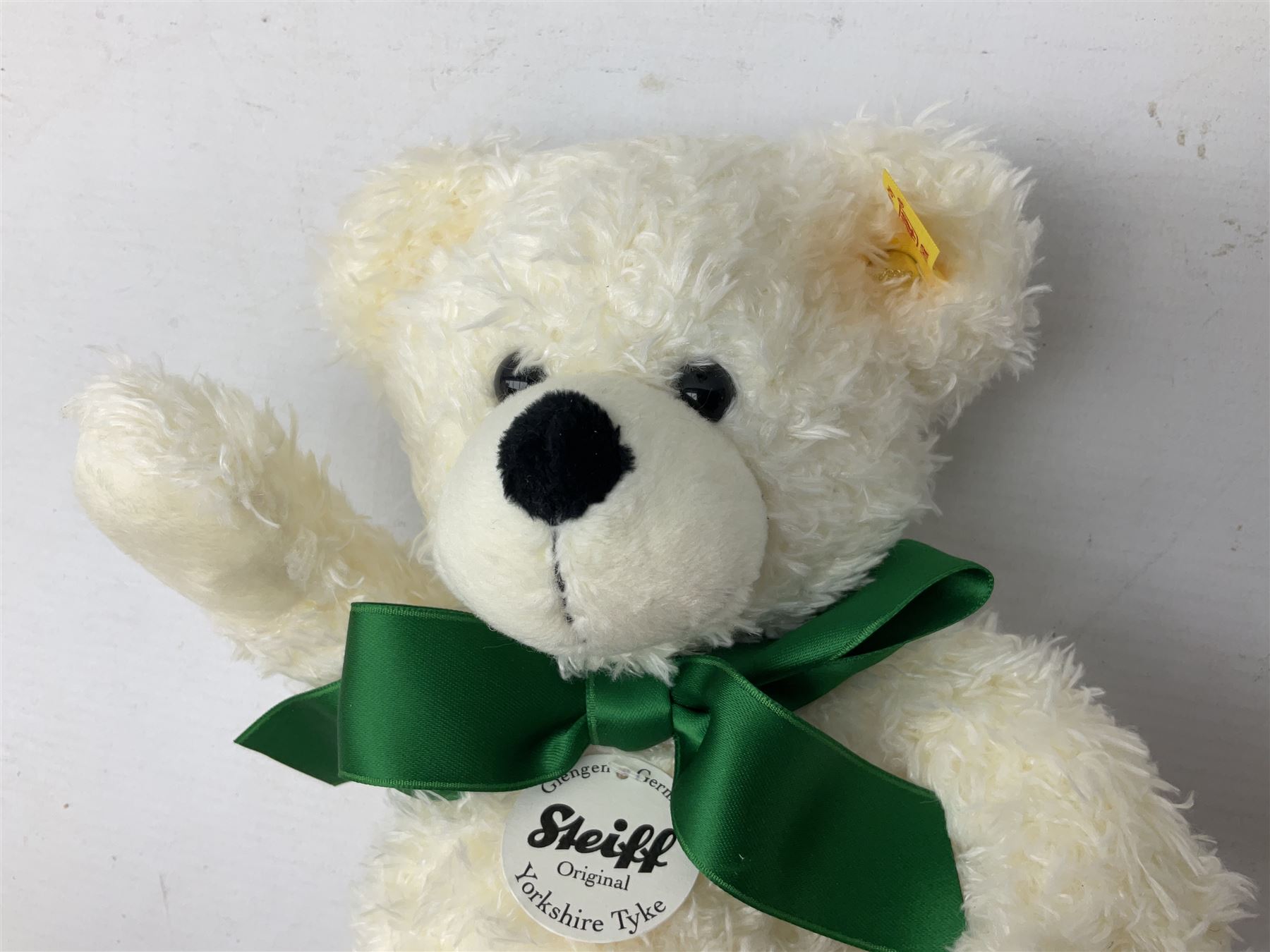 Steiff Special Edition Prince Charles black bear, with HRH coat of arms on foot and growler mechanism, with white tag ear label, in original box, together with Steiff 'Yorkshire Tyke' bear with rose on foot