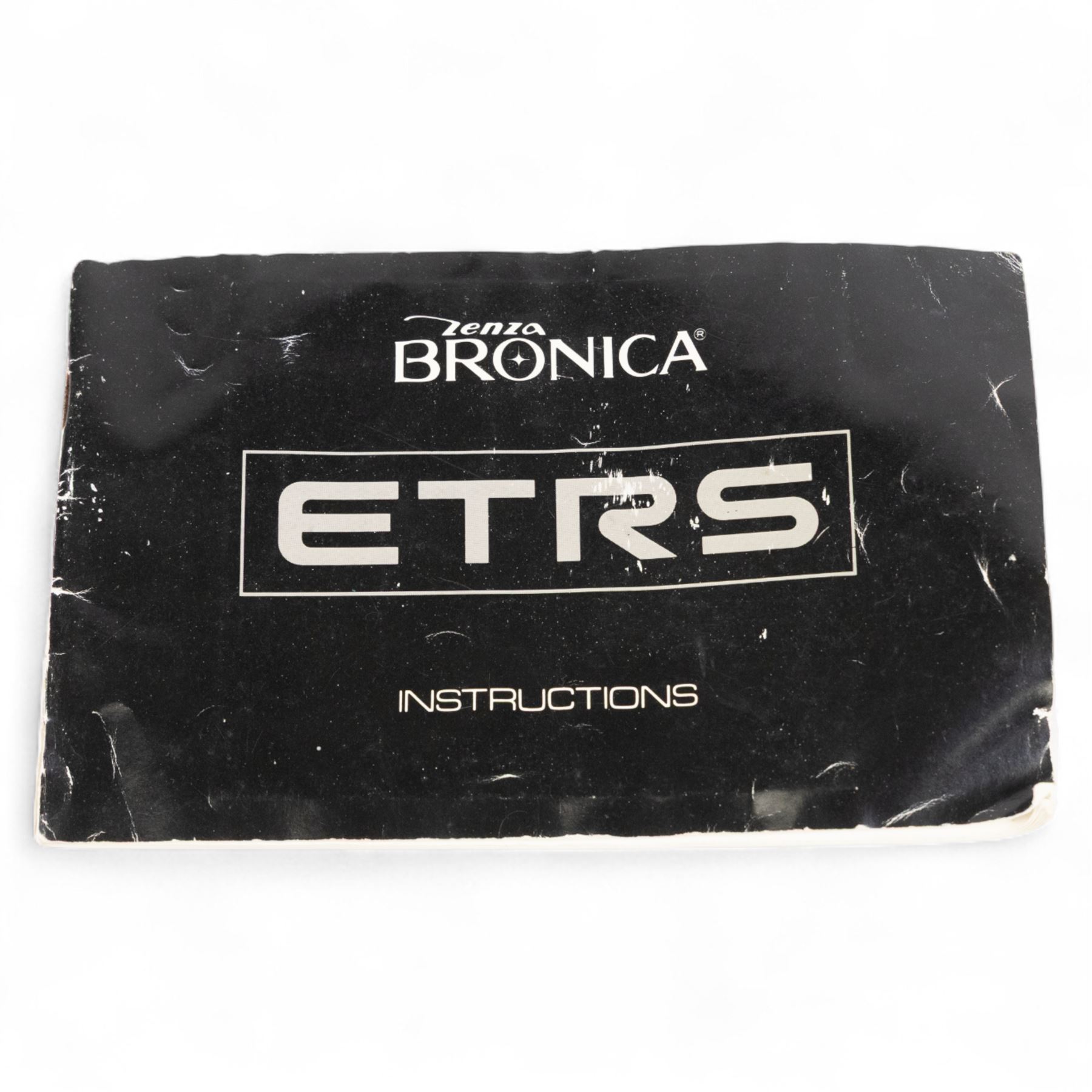 Zenza Bronica ETRS medium format camera, serial no. 8301079, with Zenza Bronica Zenzanon EII 1:2.8 f=75mm lens with lens cap, serial no. 7955198 and two film backs and instruction booklet