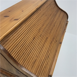 Solid pine twin pedestal shaped tambour roll top desk, fitted interior, eight drawers, shaped plinth base, W117cm, H111cm, D55cm