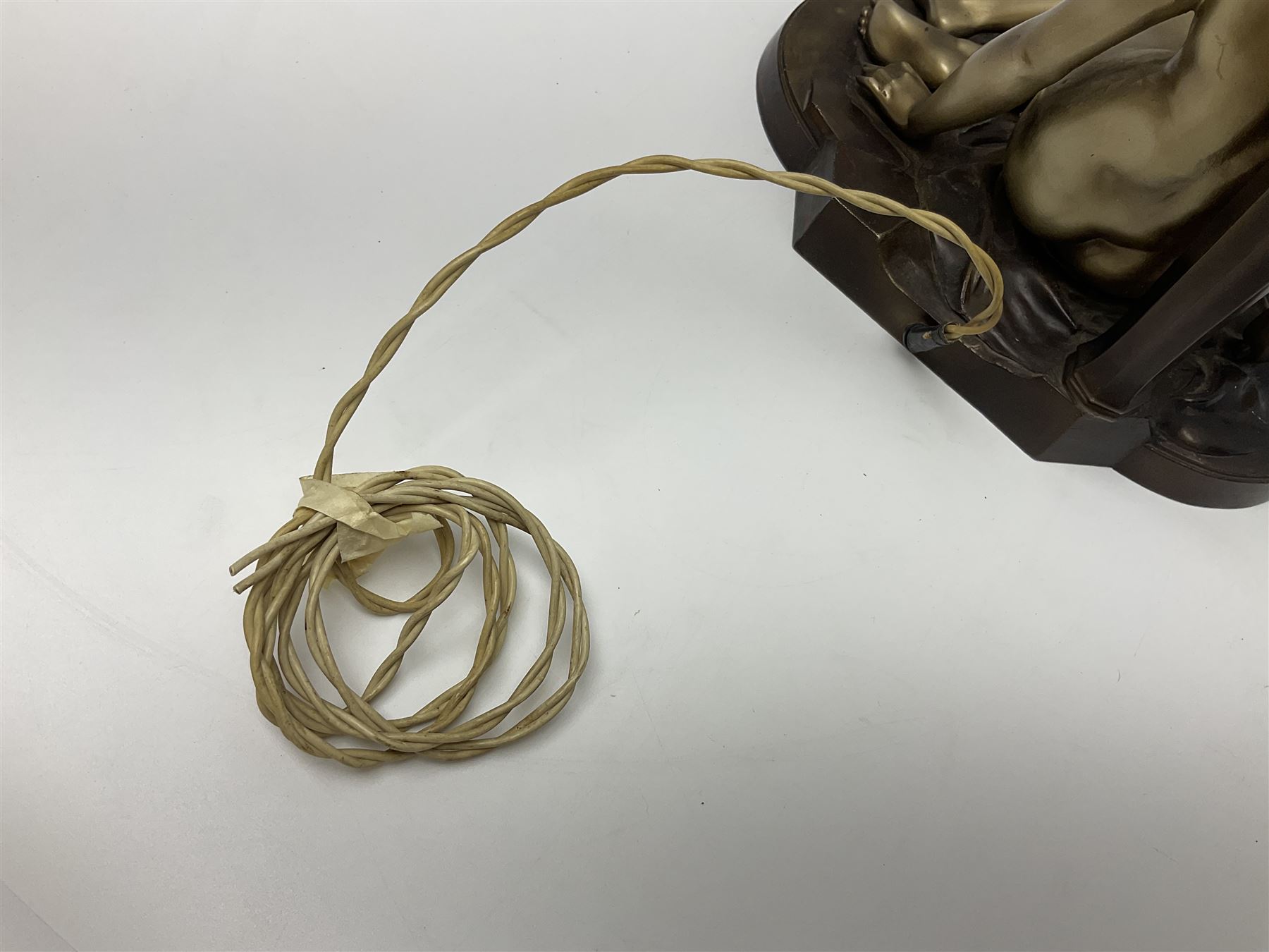 Art Deco style bronzed and gilded spelter figural table lamp with green Uranium glass shade; H48cm, another table lamp; and a bisque group