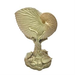Royal Worcester blush ivory Nautilus shell with coral shape support and decorated with shells to base, mark beneath, H17cm  