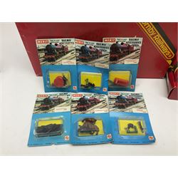 Hornby '00' gauge - R004 Suburban Station, R576 Tunnel, R146 Modern Engine Shed, R629 Level Crossing, R203 Signal Gantry Kit, R145 Signal Box and R201/202 Signal kits; four goods wagons; six unopened Merit Railway Accessories packs; and H & M Duette dual control unit; all boxed (19)