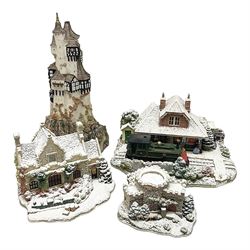 Five Lilliput Lanes, comprising Christmas at Woody Bay Station and Calling Home for Christmas both from the Illuminated collection, Castle of the Exiled Prince, Castle of The Ransomed King and Helvellyn, all with original boxes (5)