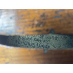 Late 19th century German trade violin c1890 with 36cm two-piece birds-eye maple back, neck and ribs and spruce top; bears label 'Manufactured in Berlin Special Copy of Nicolaus Amati' L59.5cm; in carrying case