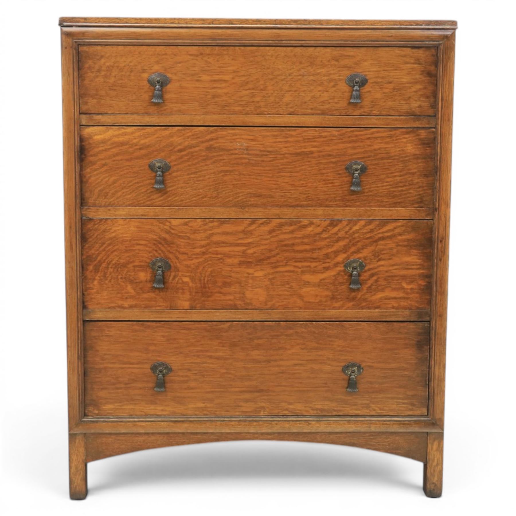 20th century oak chest, shaped gallery top over four graduating drawers, with metal drop handles, raised on stile feet 
