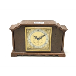  Elliott mahogany and burr wood architectural cased mantle timepiece, the gilt metal Roman dial with winged mask head spandrels and silvered chapter ring, eight day movement H14cm  