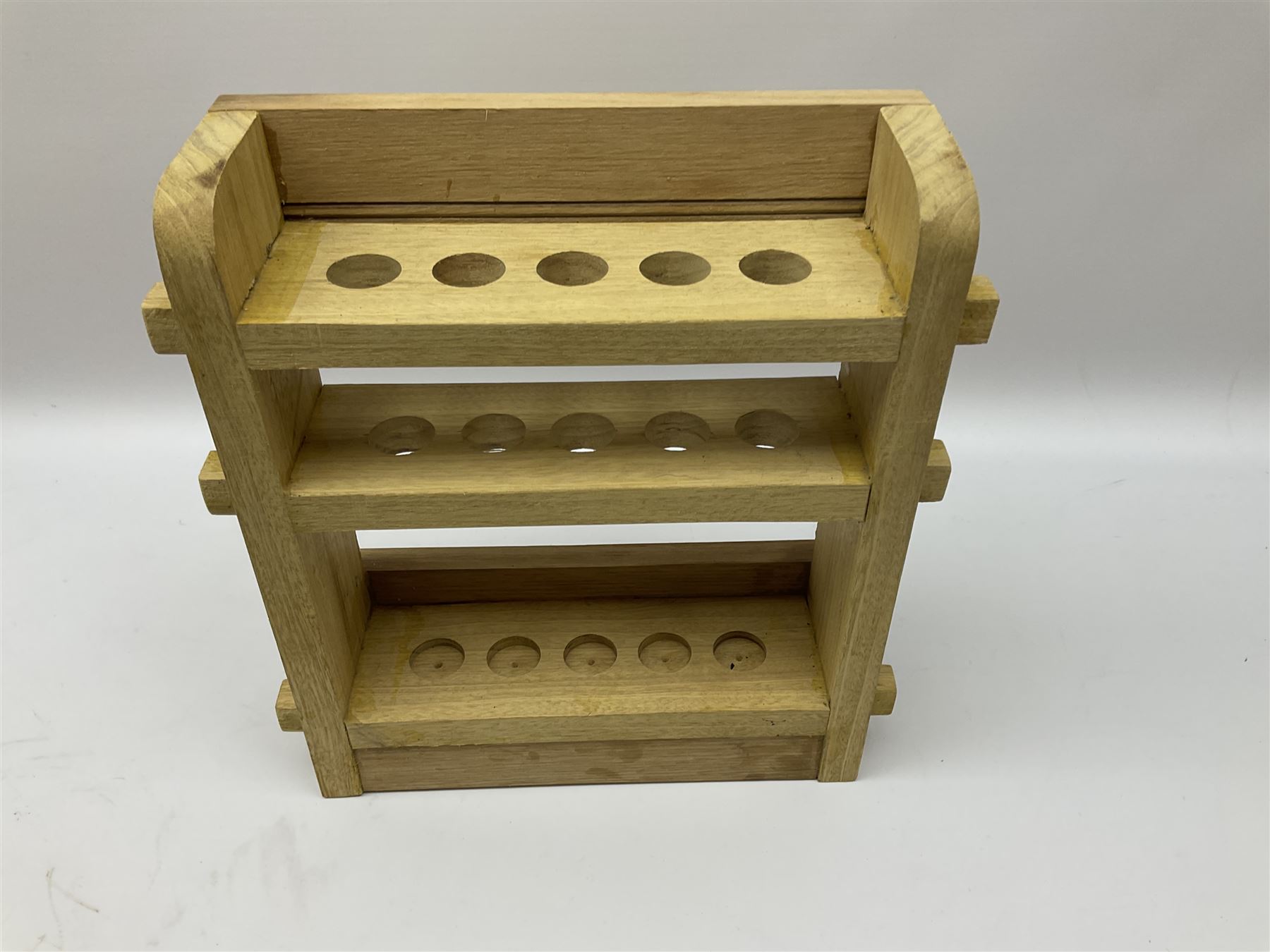 Pipes and two tiered wooden rack together with eleven pipers, including briar pipe carved as a wolf, Sea Dog straight pipe, John Brumfit pipe, meerschaum pipe ect, pipe rack H29.5cm