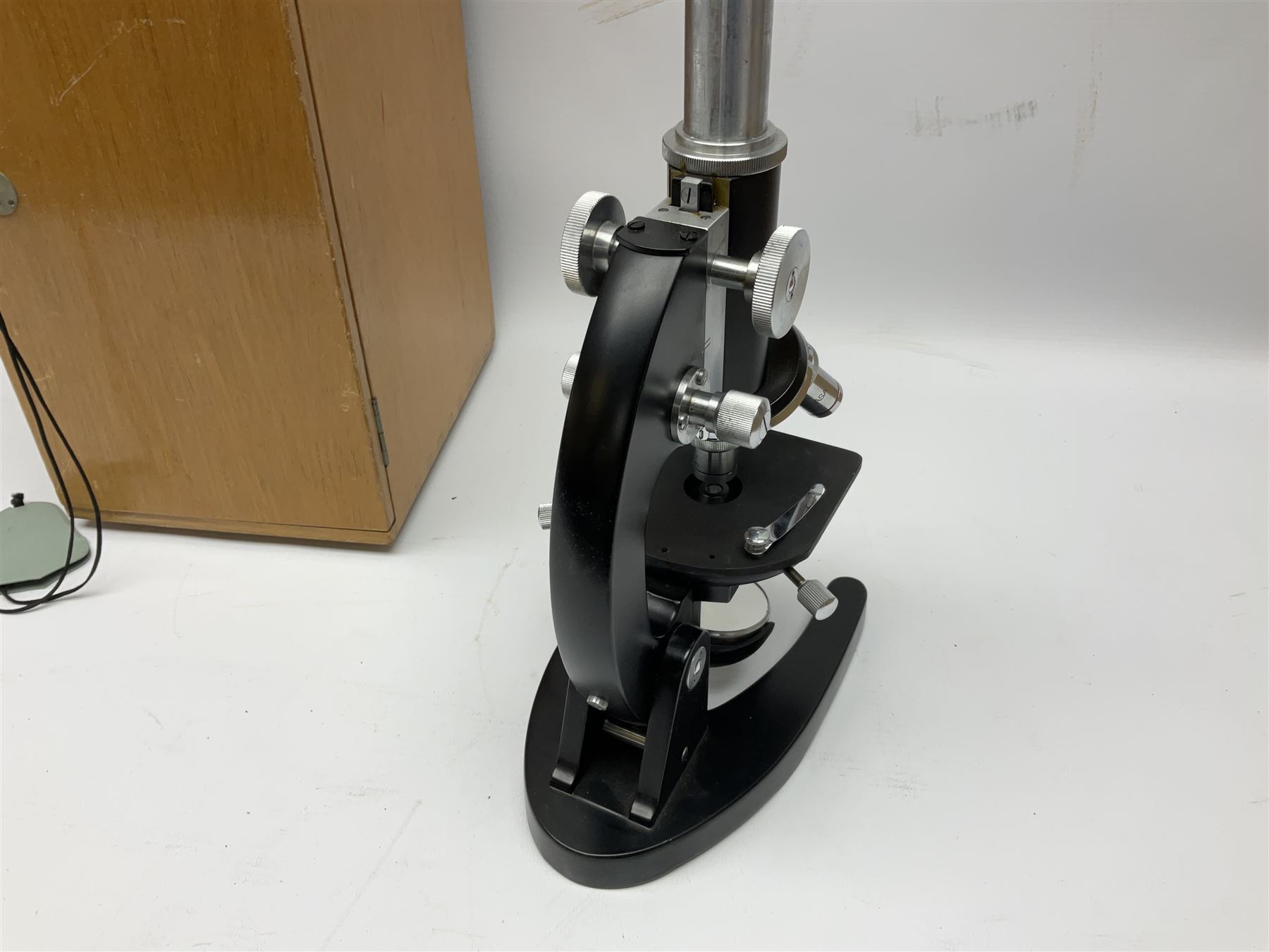 ASA Tokyo monocular microscope with black body, pitchfork base and wooden carrying box containing additional lenses No.47324 H29cm; Universal Avometer Model 8x Mk.III (Panclimatic); and Dansette 222 portable transistor radio (3)