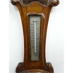 Edwardian carved oak aneroid barometer and thermometer, H89cm  